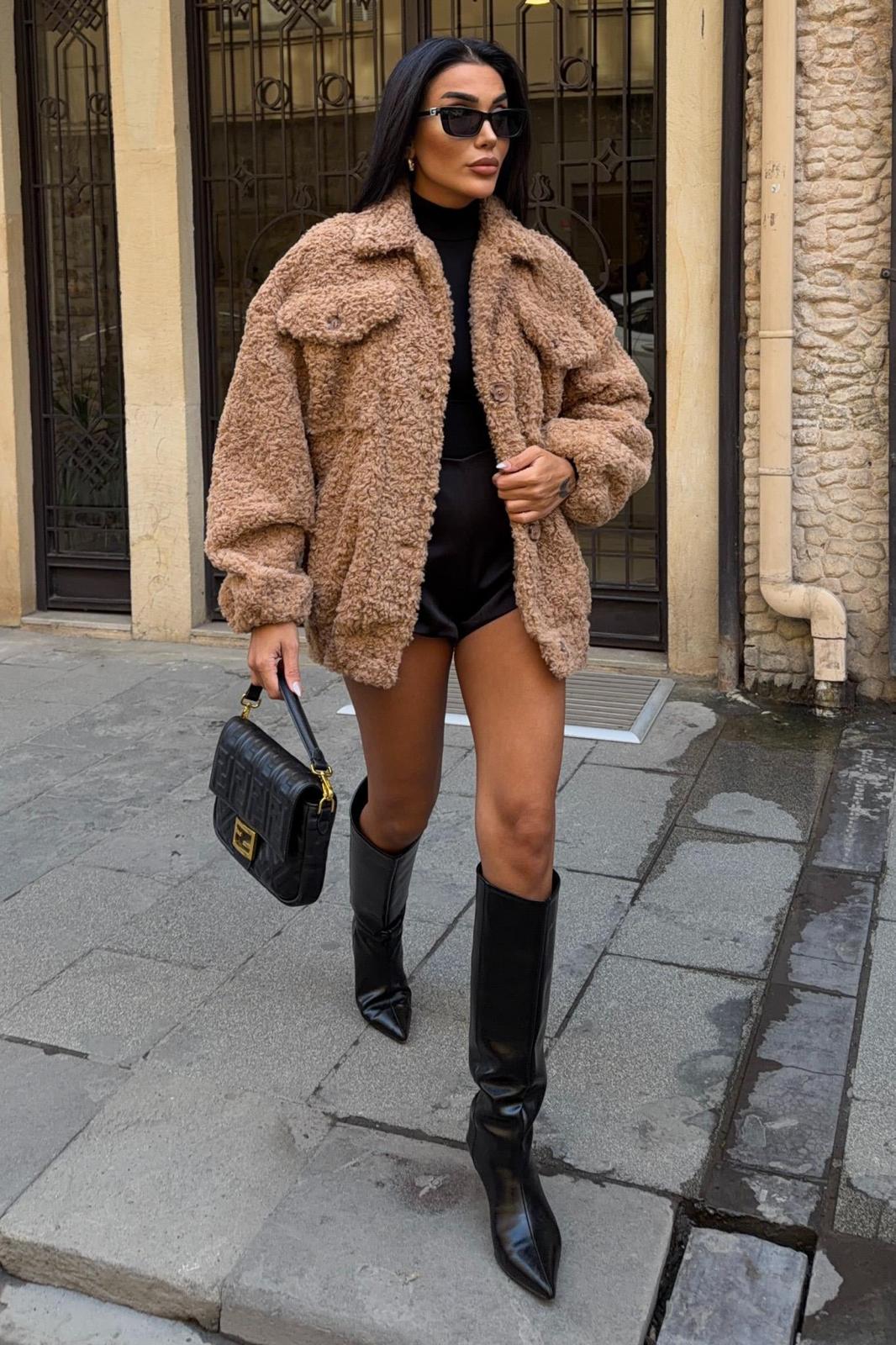 Model wearing a rust colored matching set